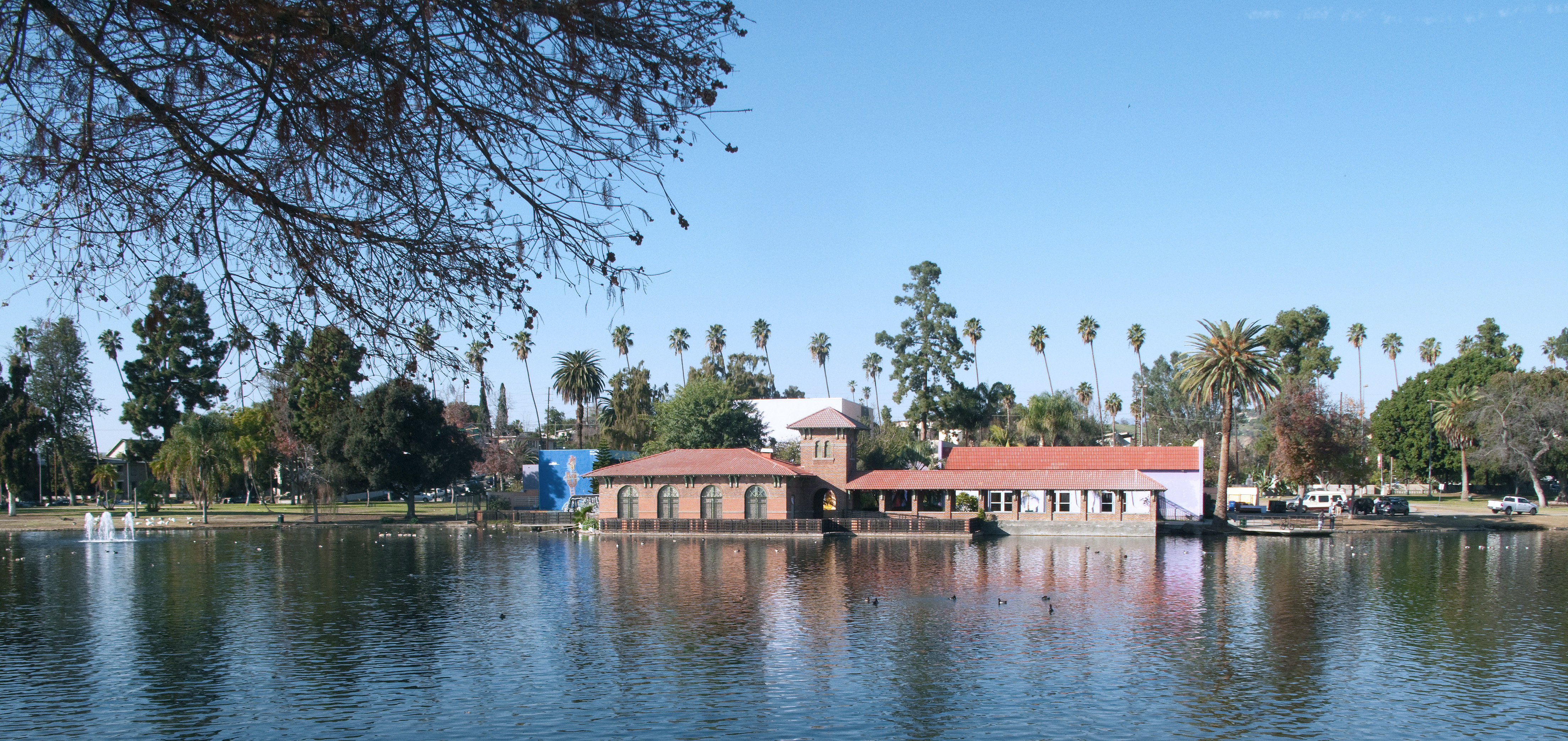 Lincoln Park Lake in Los Angeles, photographed in January 2015, with park buildings and trees across the water.